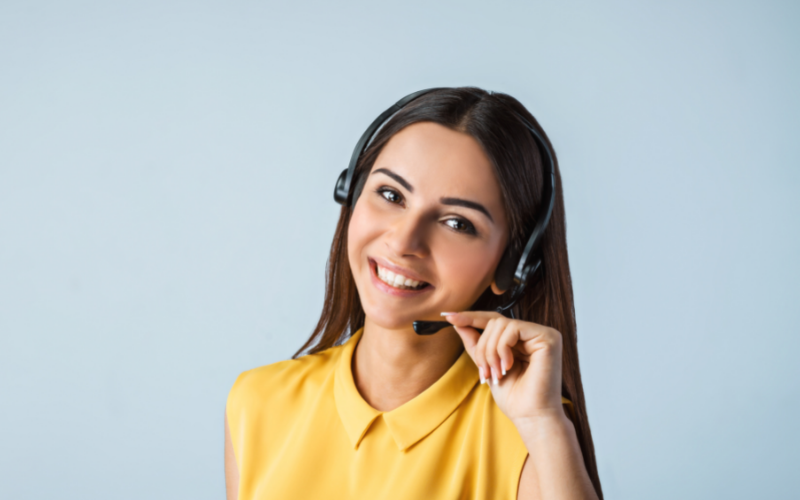 a telemarketing professional wearing headphones