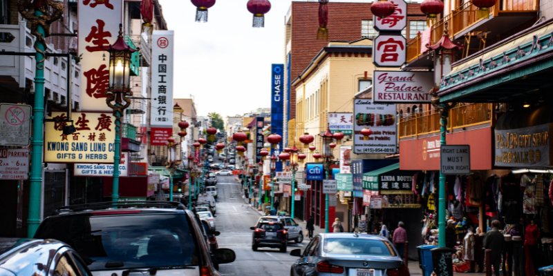 a city street filled with lots of traffic