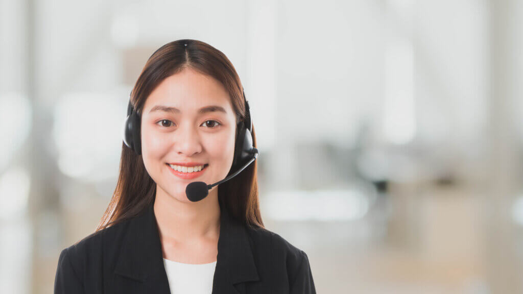 a telemarketer smiling