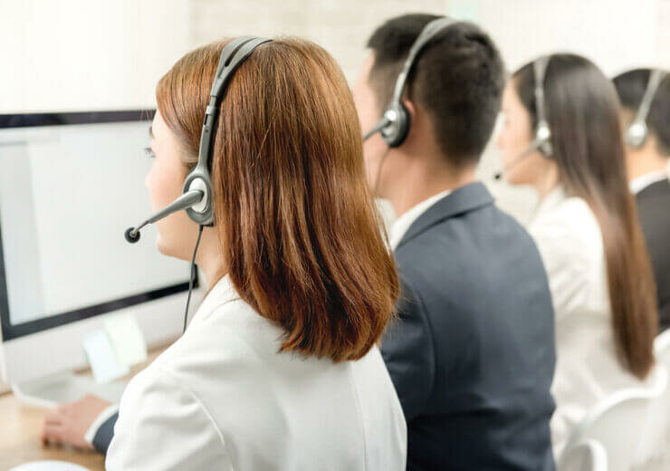 Back,View,Of,Asian,Telemarketing,Customer,Service,Agent,Team,,Call