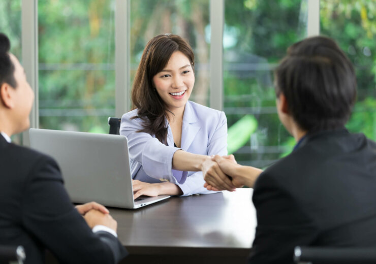 Asian,Business,Woman,Shaking,Hands,After,A,Successful,Job,Interview