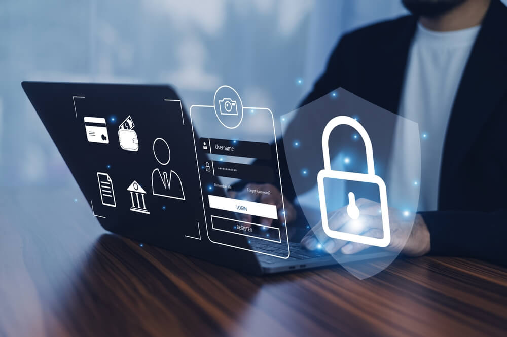 a bpo professional using a laptop with floating security icons 