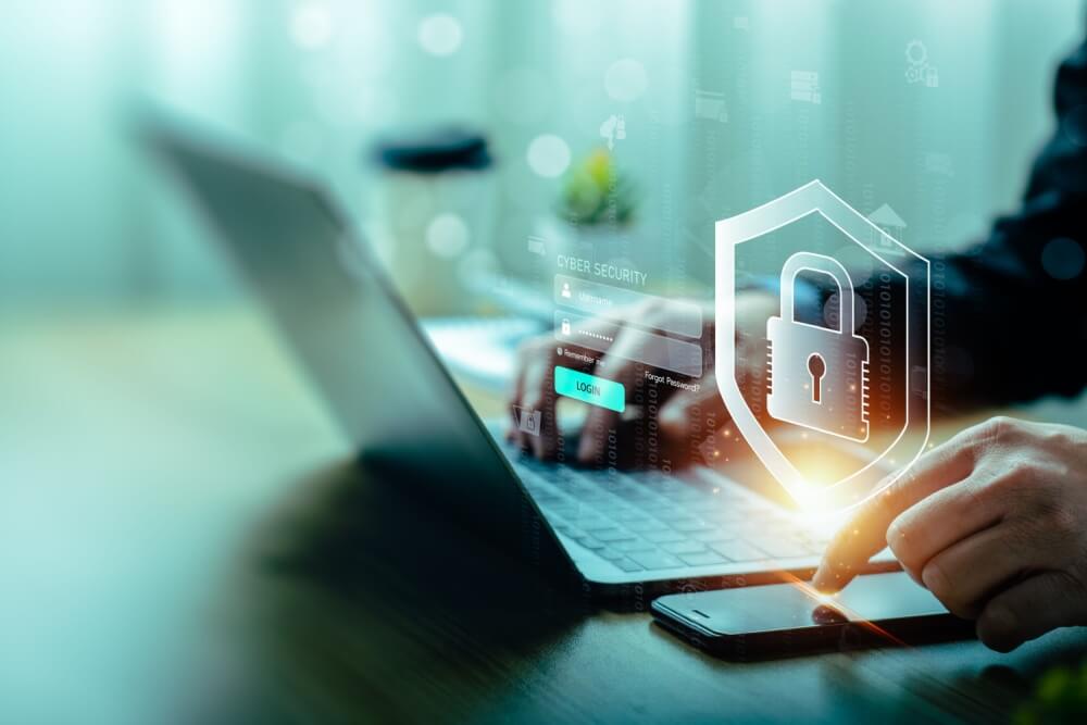 an it expert using a laptop